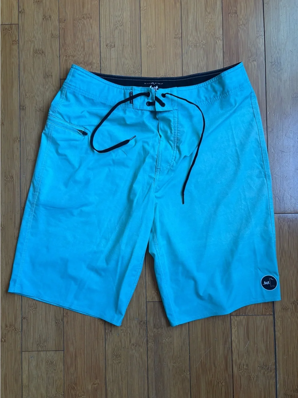 Blue / Aqua Men’s Board Shorts - Lost 33
